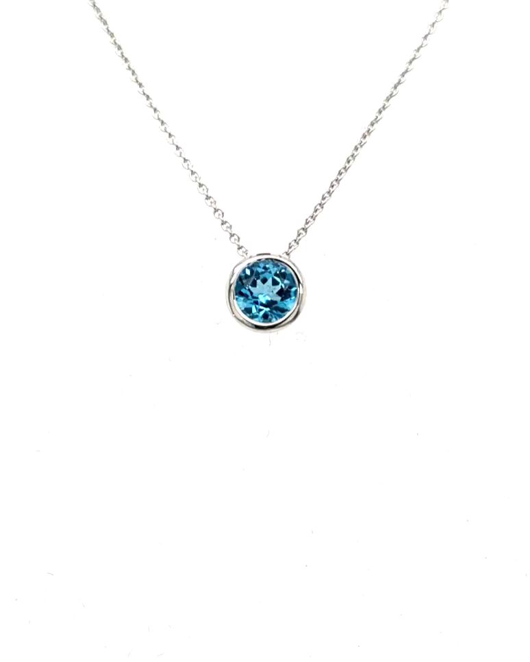 anhaenger-blauer-mIttelstein-edeltopas-weissgold-juwelier-risch
