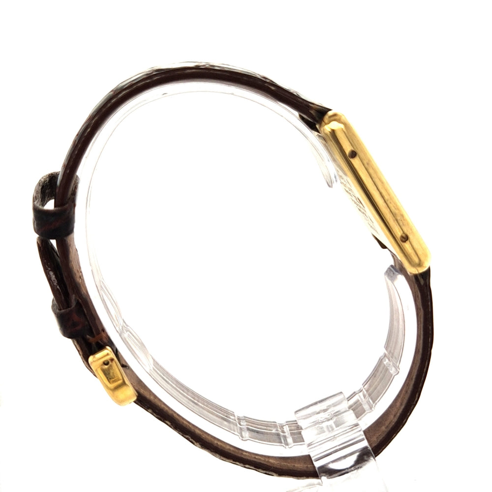 cartier-damenuhr-tank-stehend-seitlich-vergoldet-roemische-Zahlen-lederband-juwelier-risch