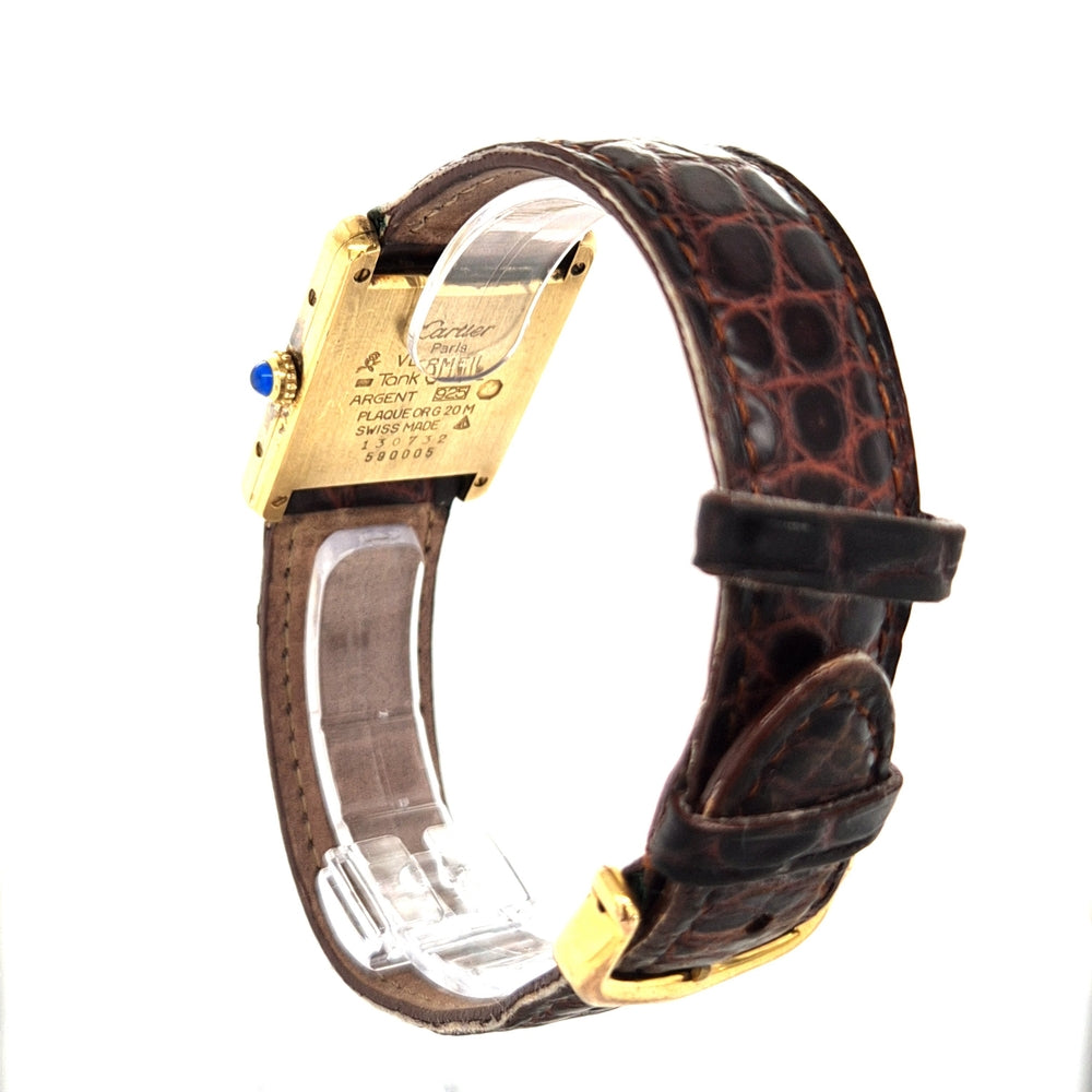 cartier-damenuhr-tank-stehend-schraeg-von-hinten2-vergoldet-roemische-Zahlen-lederband-juwelier-risch