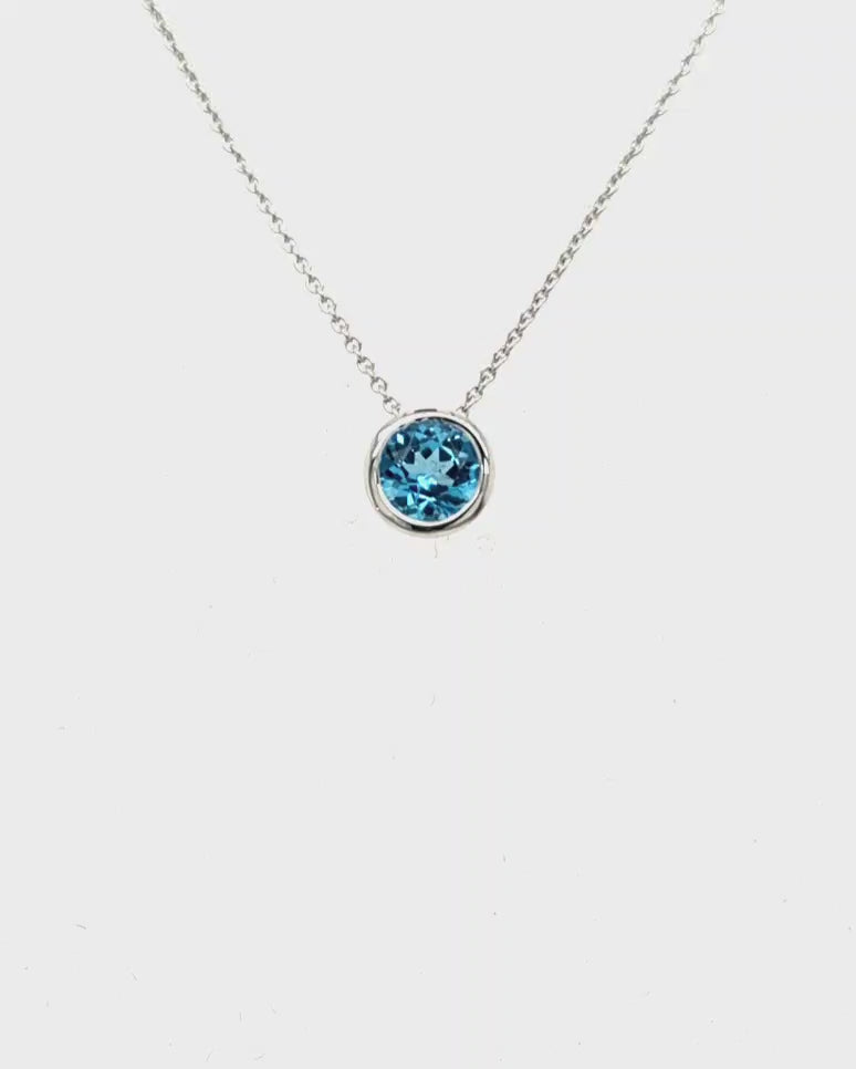 anhaenger-blauer-mIttelstein-edeltopas-weissgold-juwelier-risch-videos