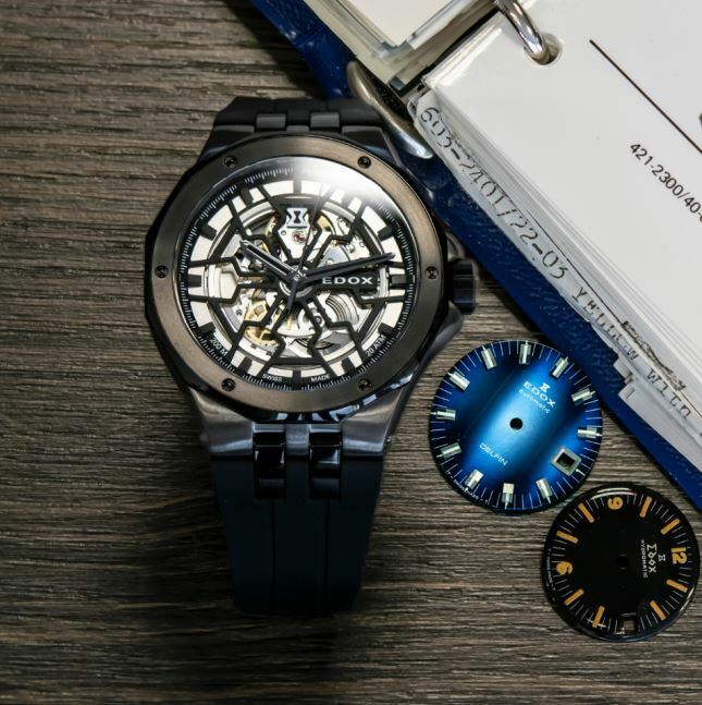 EDOX Uhr Delfin in Edelstahl schwarz beschichtet mit schwarzem Kautschukband und skelettiertem Zifferblatt