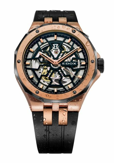 EDOX Uhr Delfin in Edelstahl roségoldfarben beschichtet mit schwarzem Kautschukband und skelettiertem Zifferblatt mit Wassertropfen auf Band und Gehäuse, frisch aus dem Wasser
mit der Referenz 85303-357RN-NRN