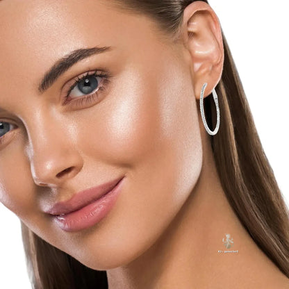 Creole-an-Frauenohr-brillanten-juwelier-risch