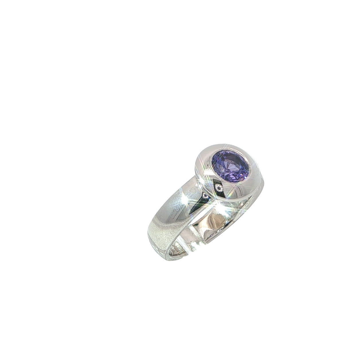Ring-tansanit-blauviolett-brillantschliff-auf-ringschiene-weissgold-juwelier-risch