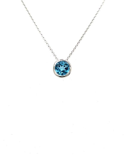 anhaenger-blauer-mIttelstein-edeltopas-weissgold-juwelier-risch