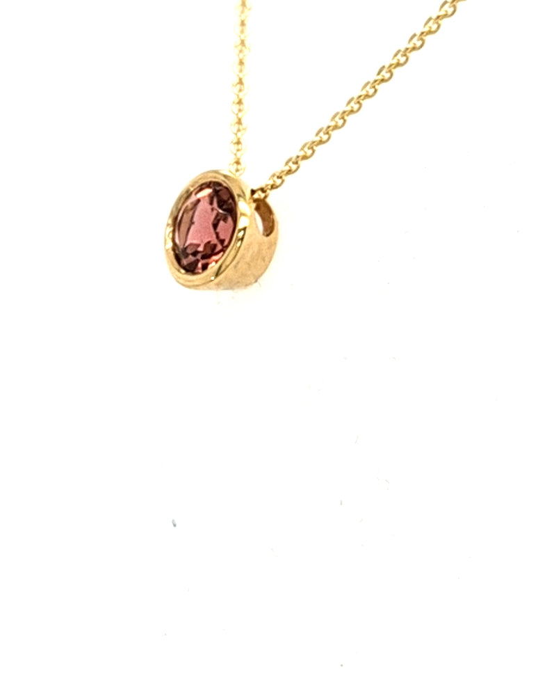 anhaenger-pinker-mIttelstein-turmalin-gelbgold-juwelier-risch