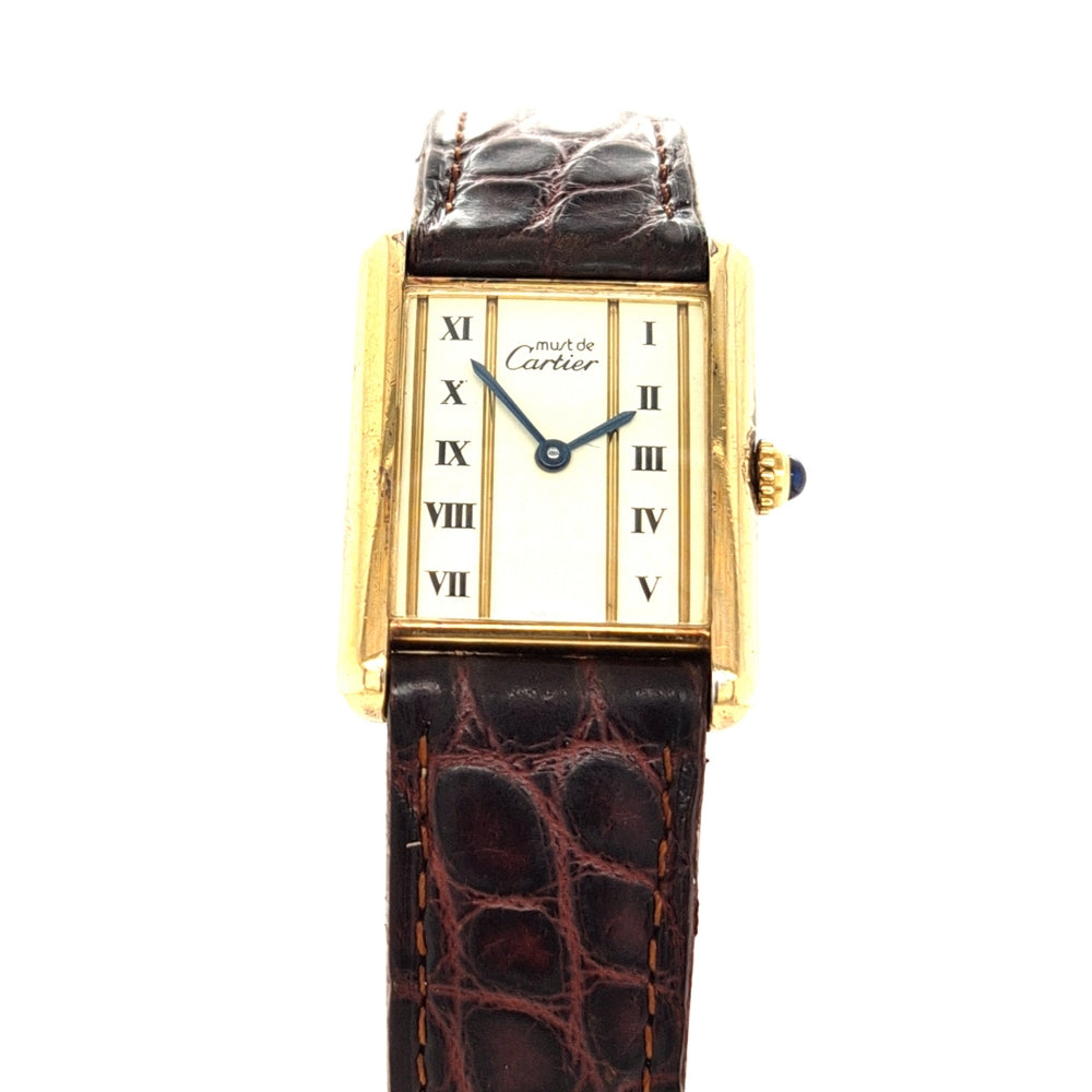 cartier-damenuhr-tank-stehend-vergoldet-roemische-Zahlen-lederband-juwelier-risch