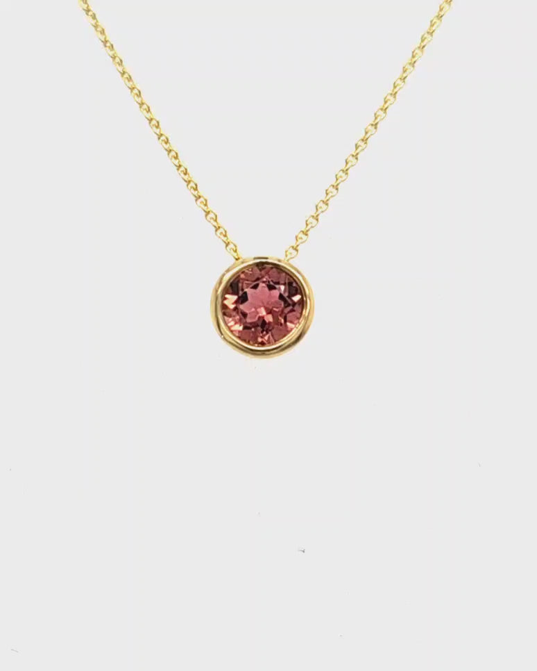 anhaenger-pinker-mIttelstein-turmalin-gelbgold-video-juwelier-risch